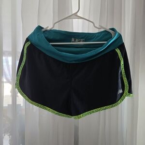 New Balance Black Athletic Shorts with Teal Waistband and Lime Trim